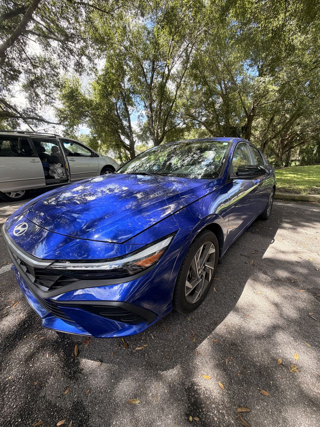 Blue Hyundai Elantra with mirror-finish paint correction