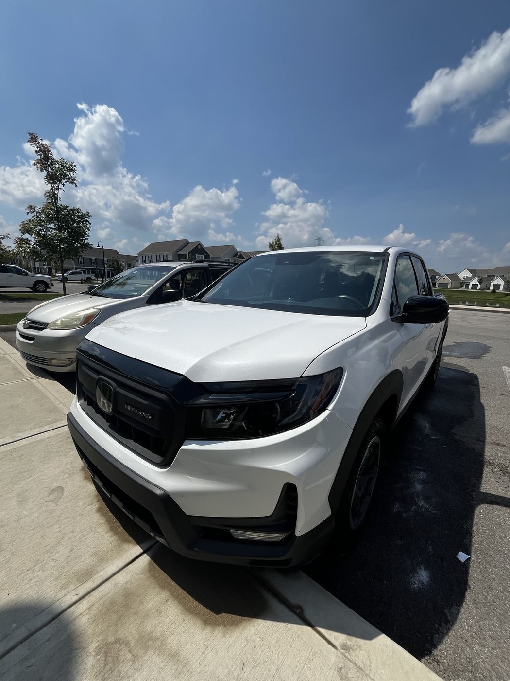White Honda Ridgeline full luxury detail